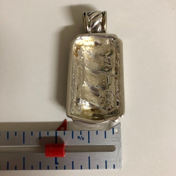 Silver colored oblong pendant 2 in by 1 in - light gold trim - Picture 9 of 9